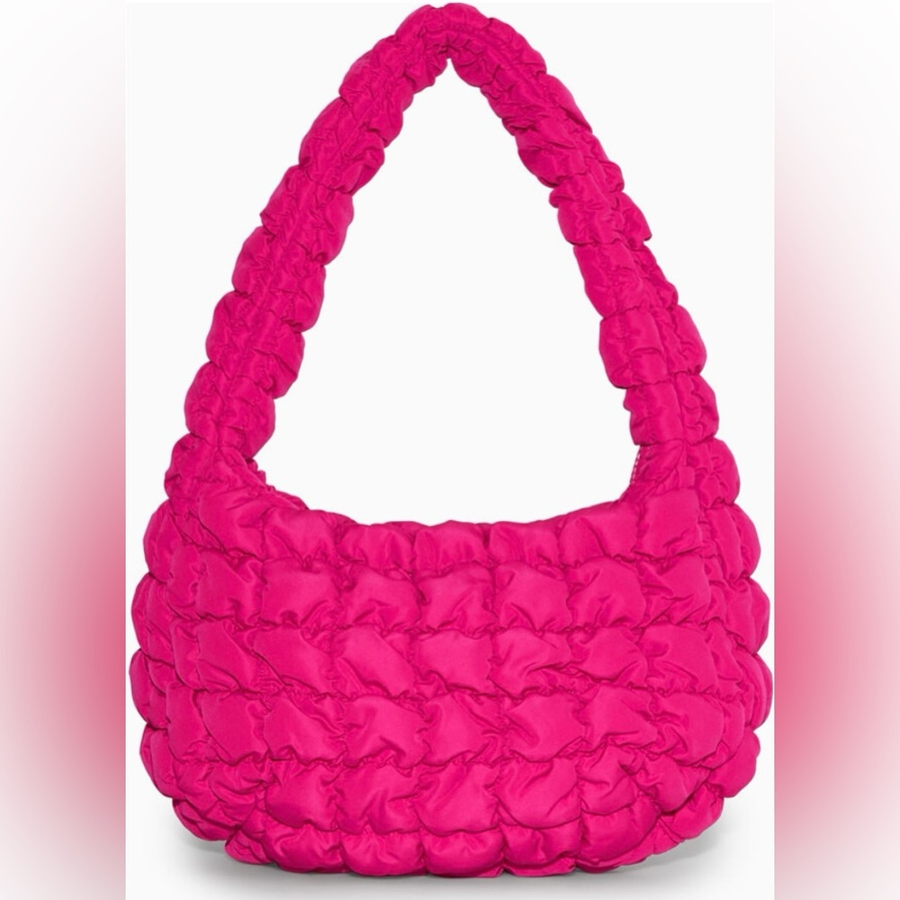 COS bright pink quilted mini bag.